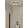 Nuura – Liila Star wall / ceiling lamp, nordic gold and clear glass